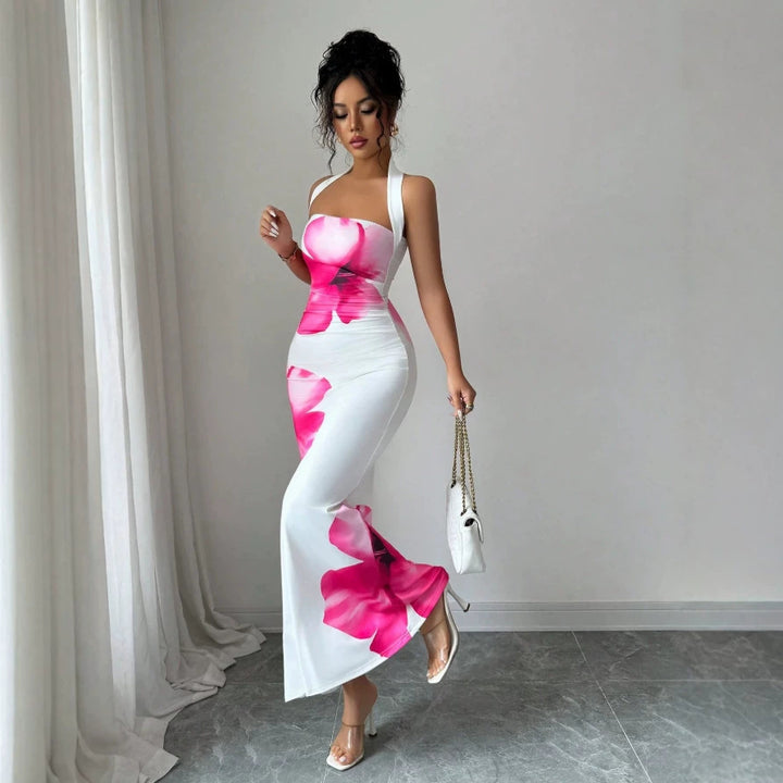 Dam Maxi klänning med blommigt tryck och avskuret design Mirla-Eva Jonsson