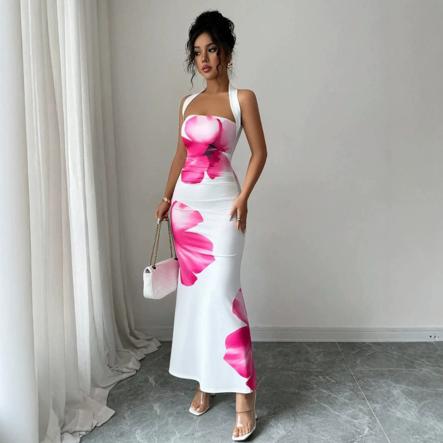 Dam Maxi klänning med blommigt tryck och avskuret design Mirla-Eva Jonsson