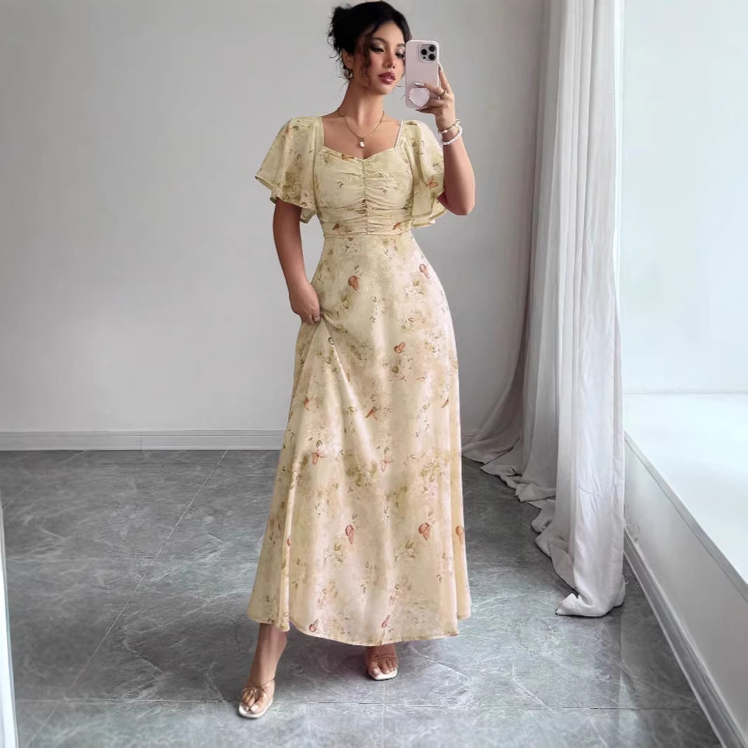 Dam Maxi klänning med flödande snitt och romantisk blommönster Mirla-Eva Jonsson