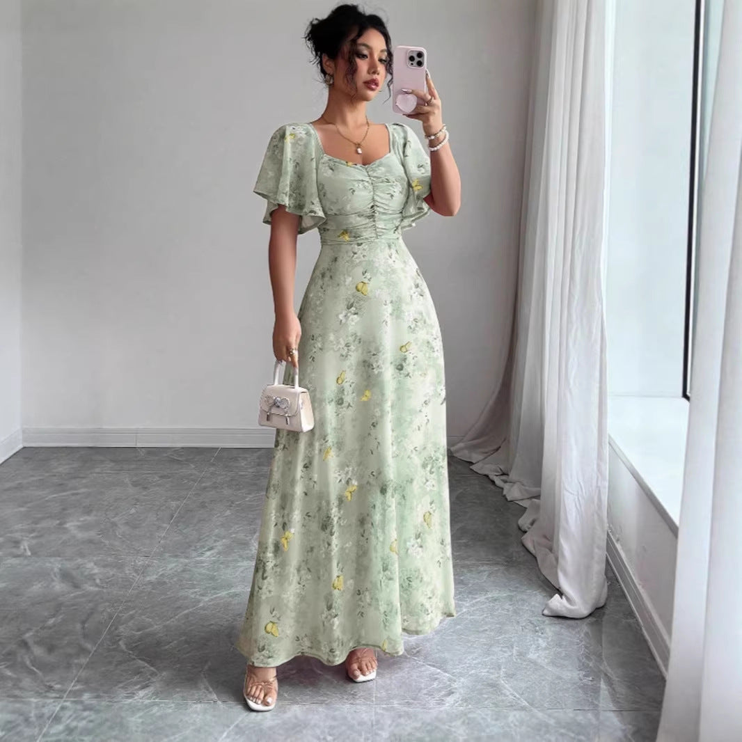 Dam Maxi klänning med flödande snitt och romantisk blommönster Mirla-Eva Jonsson