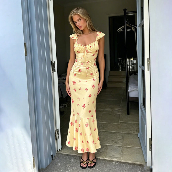 Dam Maxi klänning med raffinerad volang och blommönster Mirla-Eva Jonsson