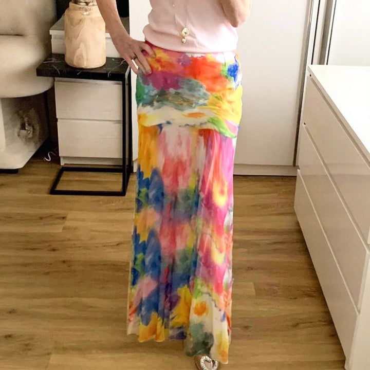 Dam Maxikjol med blommönster och utsvängd skärning Mirla-Eva Jonsson