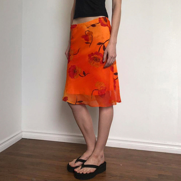 Dam Midi-kjol med blommigt transparentdesign Mirla-Eva Jonsson