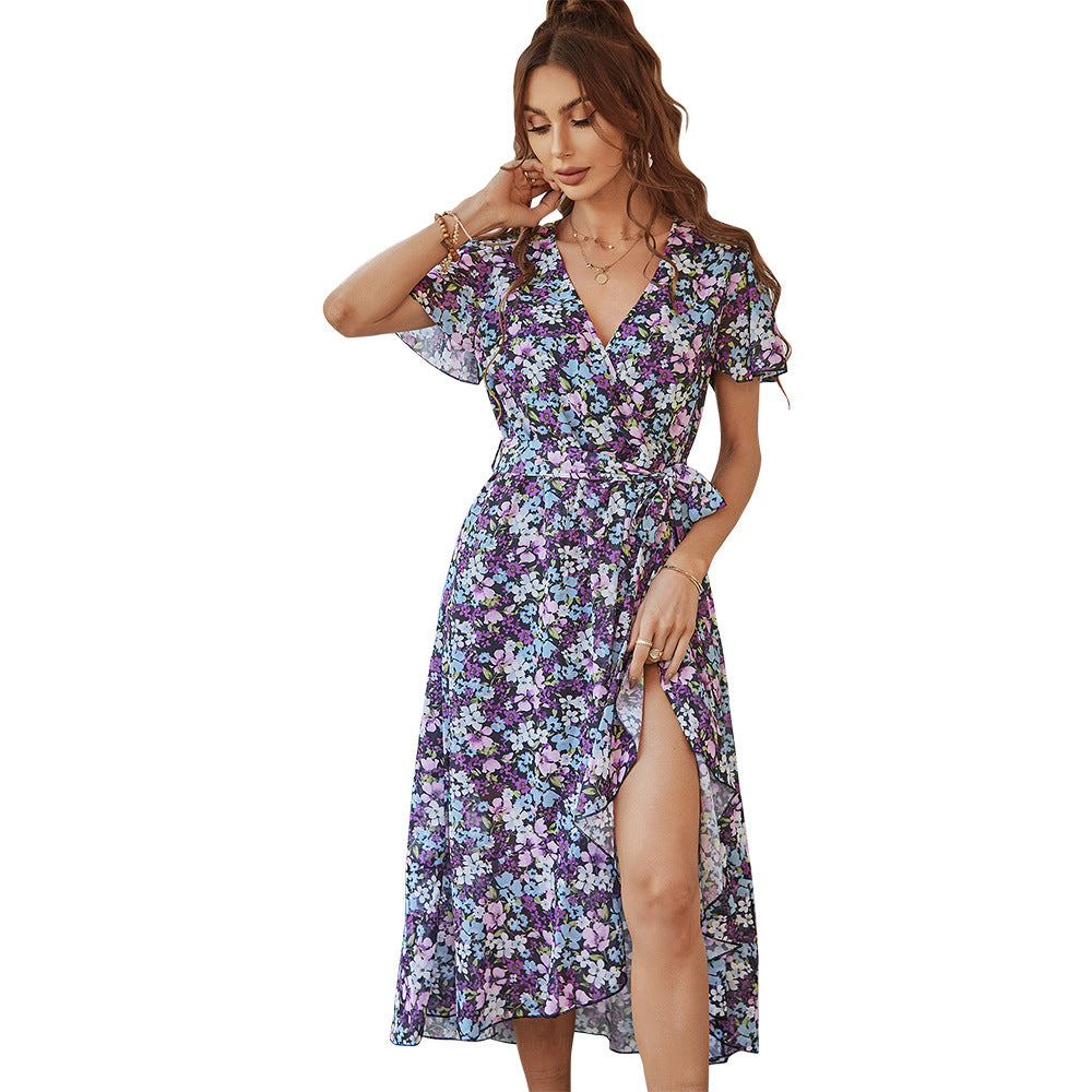 Dam Midikjol med sofistikerad wrap-design och blommönster Mirla-Eva Jonsson