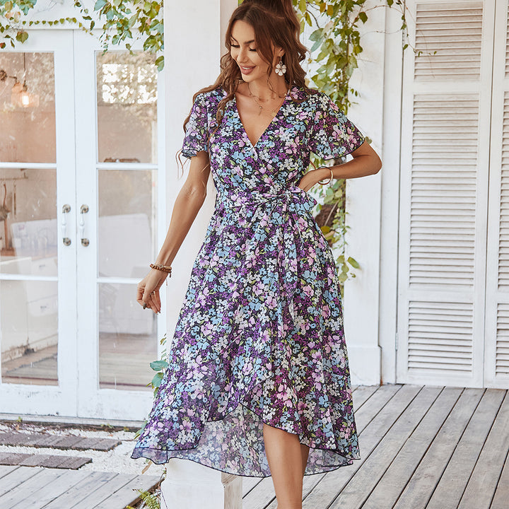 Dam Midikjol med sofistikerad wrap-design och blommönster Mirla-Eva Jonsson