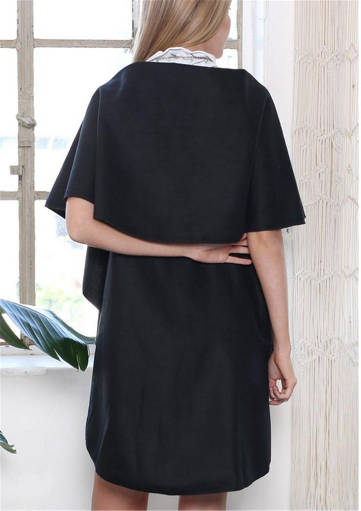 Dam Mode Cape-mantel med stor krage och asymmetrisk fåll Mirla-Eva Jonsson