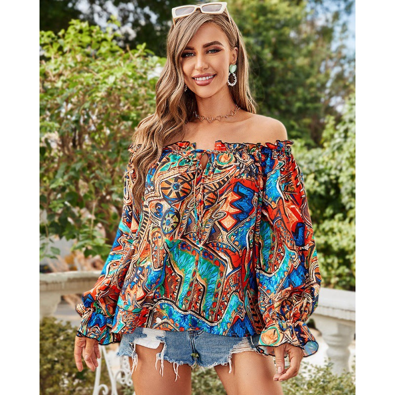 Dam Off-Shoulder Blus med Färggående Mönster och Elastisk Nederkant Mirla-Eva Jonsson