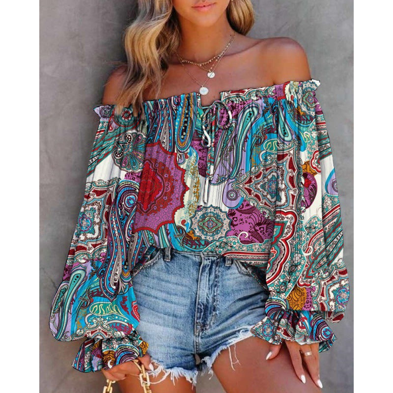 Dam Off-Shoulder Blus med Färggående Mönster och Elastisk Nederkant Mirla-Eva Jonsson