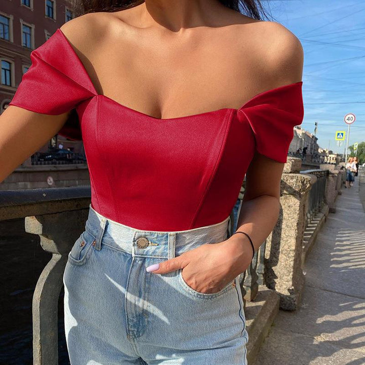 Dam Off-Shoulder Bodysuit med strukturerad silhuett och eleganta puffärmar Eva Jonsson-Eva Jonsson