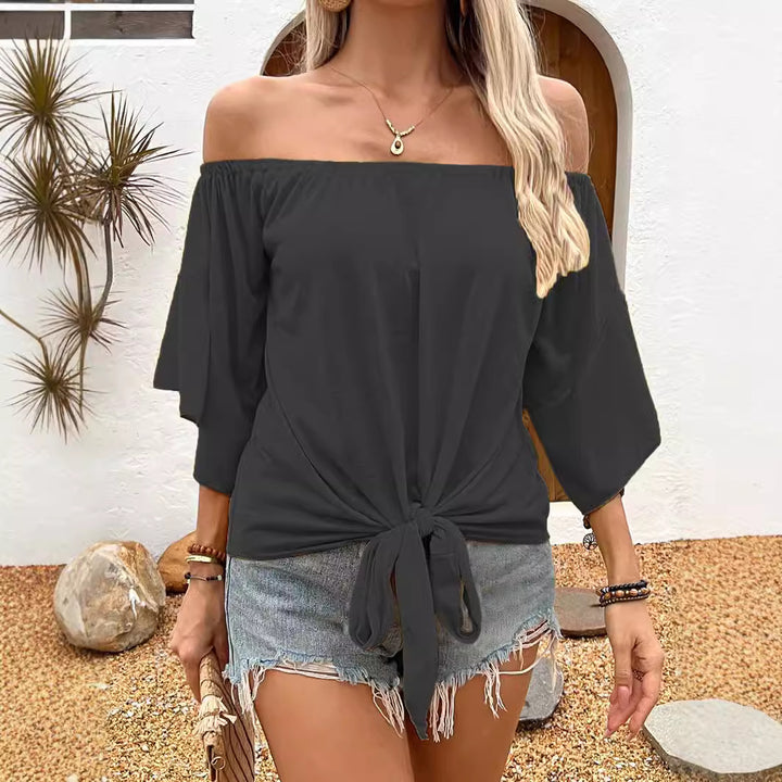 Dam Off-Shoulder Topp med knutformad design och avslappnade vingarärm Mirla-Eva Jonsson