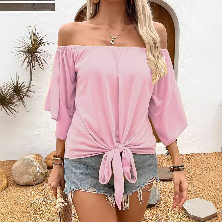 Dam Off-Shoulder Topp med knutformad design och avslappnade vingarärm Mirla-Eva Jonsson