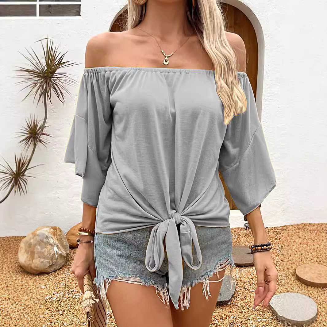 Dam Off-Shoulder Topp med knutformad design och avslappnade vingarärm Mirla-Eva Jonsson
