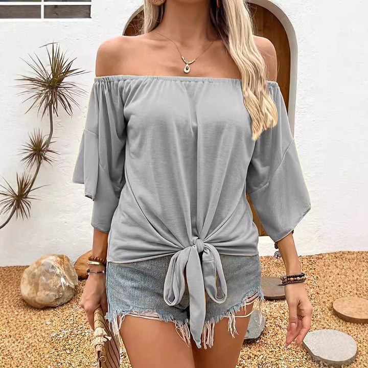 Dam Off-Shoulder Topp med knutformad design och avslappnade vingarärm Mirla-Eva Jonsson