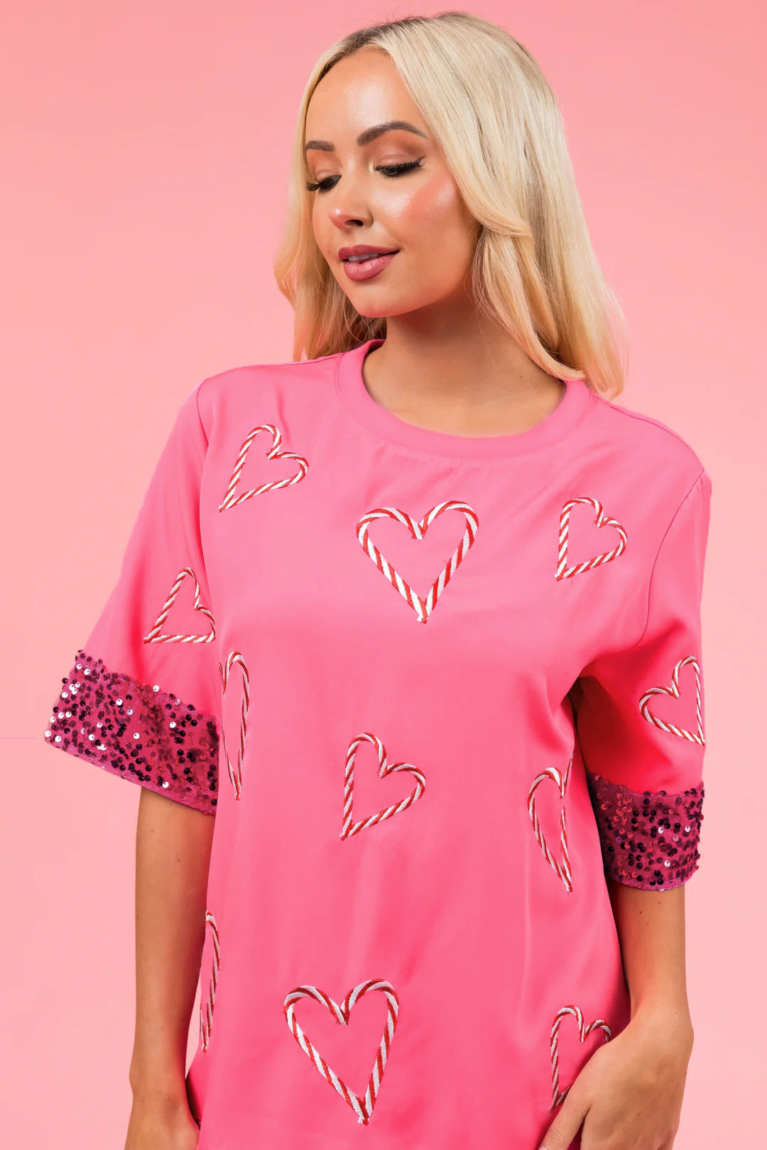Dam Oversized T-shirt med glittrande ärmar och hjärt-mönster Mirla-Eva Jonsson