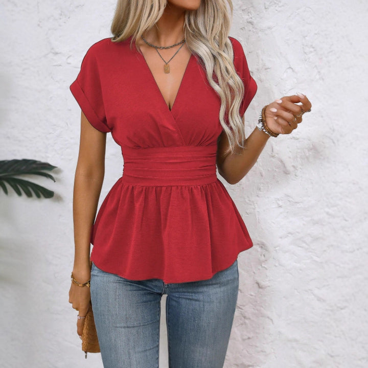 Dam Peplum-blus med V-ringning och midjebälte Mirla-Eva Jonsson