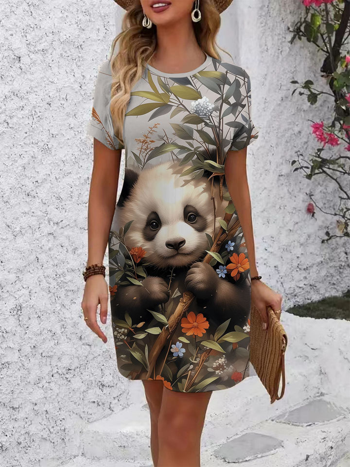 Dam T-shirt klänning med blommönster och bekväm passform Mirla-Eva Jonsson