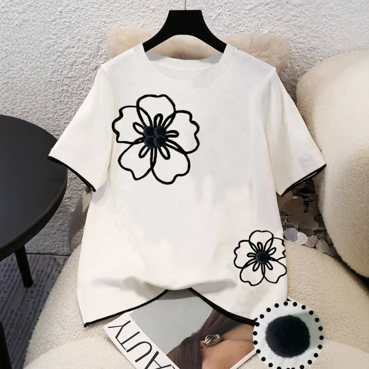 Dam T-shirt med blommigt mönster och lös passform Mirla-Eva Jonsson