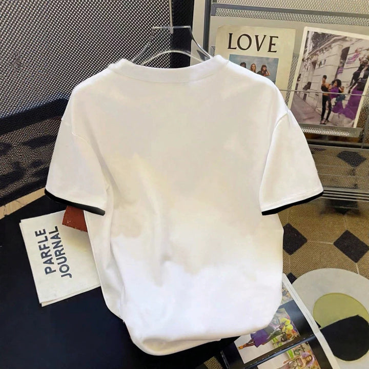 Dam T-shirt med blommigt mönster och lös passform Mirla-Eva Jonsson