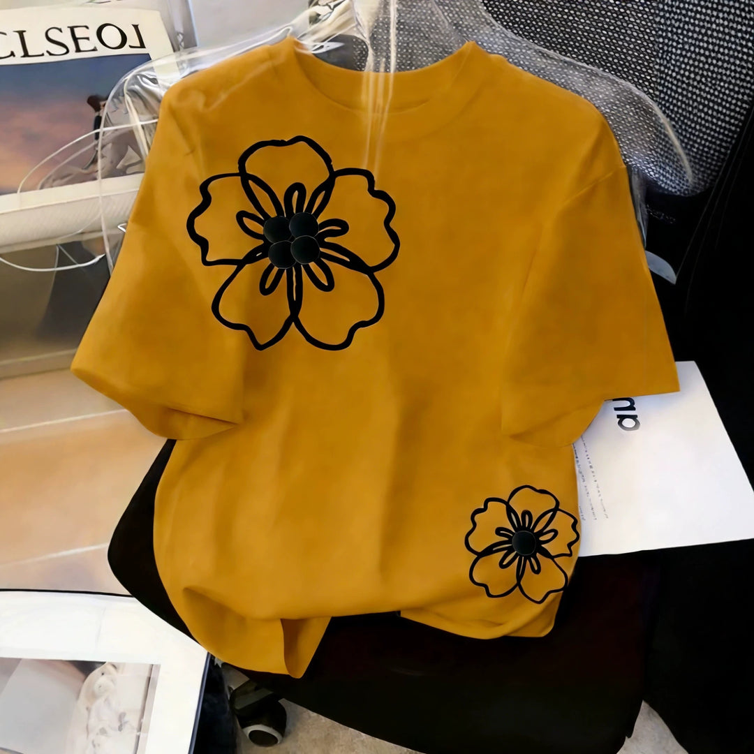 Dam T-shirt med blommigt mönster och lös passform Mirla-Eva Jonsson