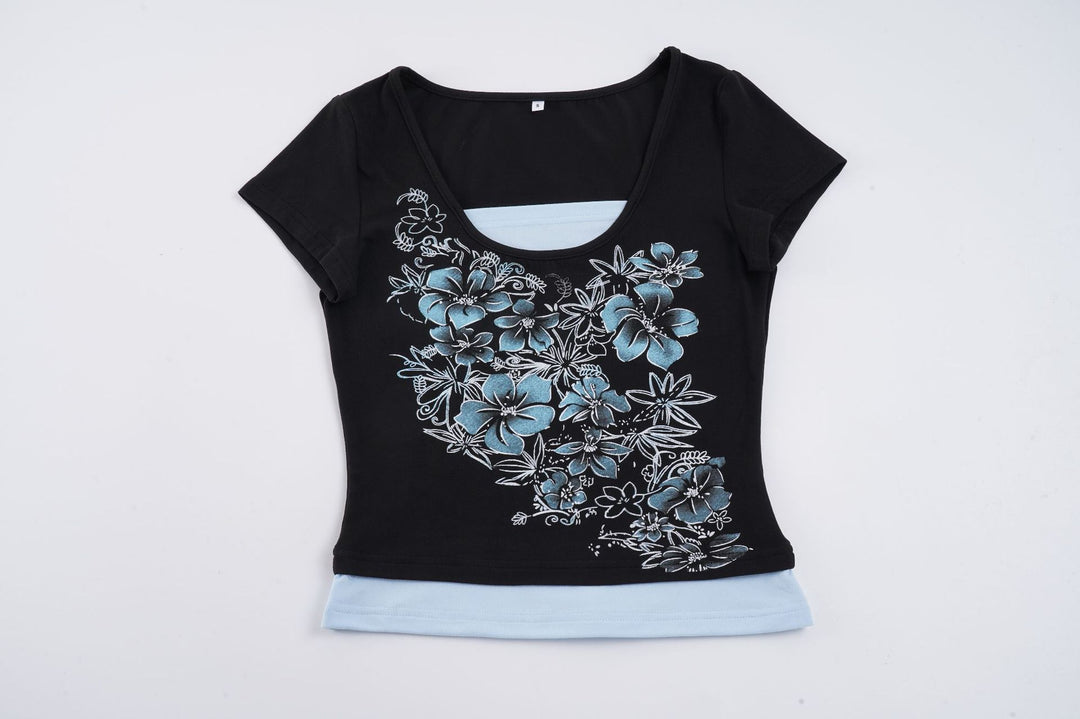 Dam T-shirt med blommigt tryck och kroppsnära snitt Mirla-Eva Jonsson