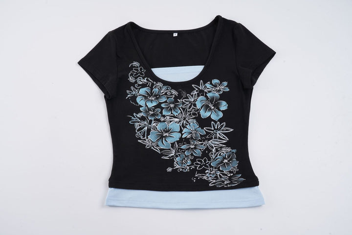 Dam T-shirt med blommigt tryck och kroppsnära snitt Mirla-Eva Jonsson