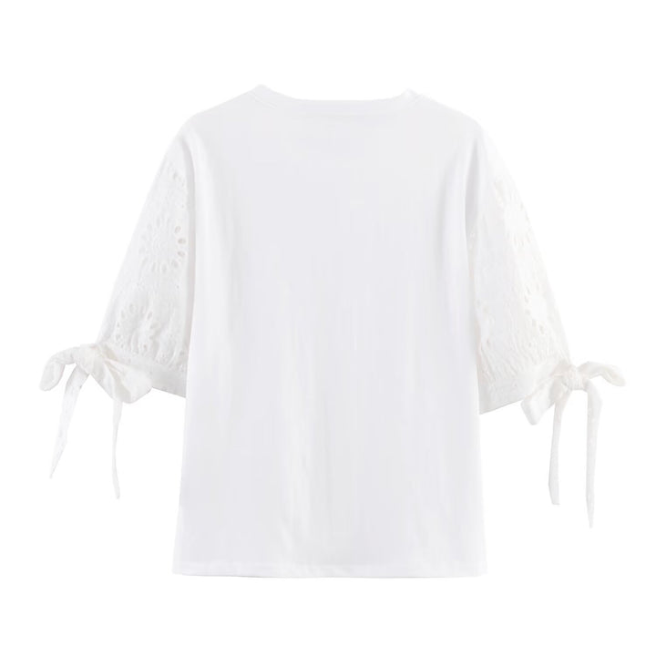 Dam T-shirt med elegant spetsdesign och tidlös snörapplikation Mirla-Eva Jonsson