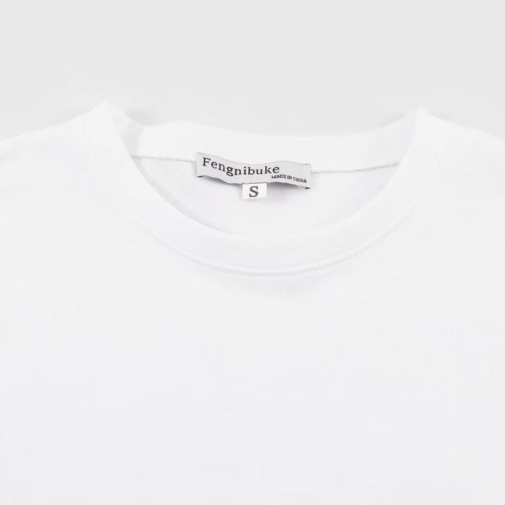 Dam T-shirt med elegant spetsdesign och tidlös snörapplikation Mirla-Eva Jonsson