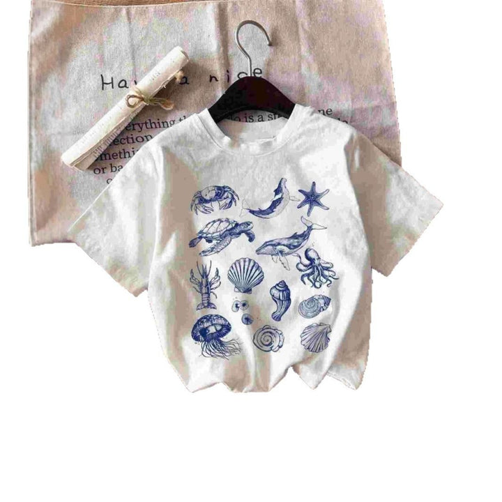Dam T-shirt med maritimt motiv och kreativ grafik Mirla-Eva Jonsson