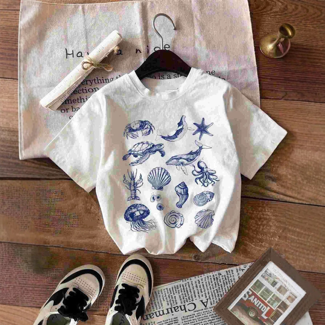 Dam T-shirt med maritimt motiv och kreativ grafik Mirla-Eva Jonsson