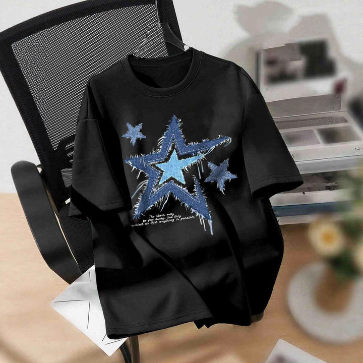 Dam T-shirt med trendig stjärnmotiv och avslappnad passform Mirla-Eva Jonsson
