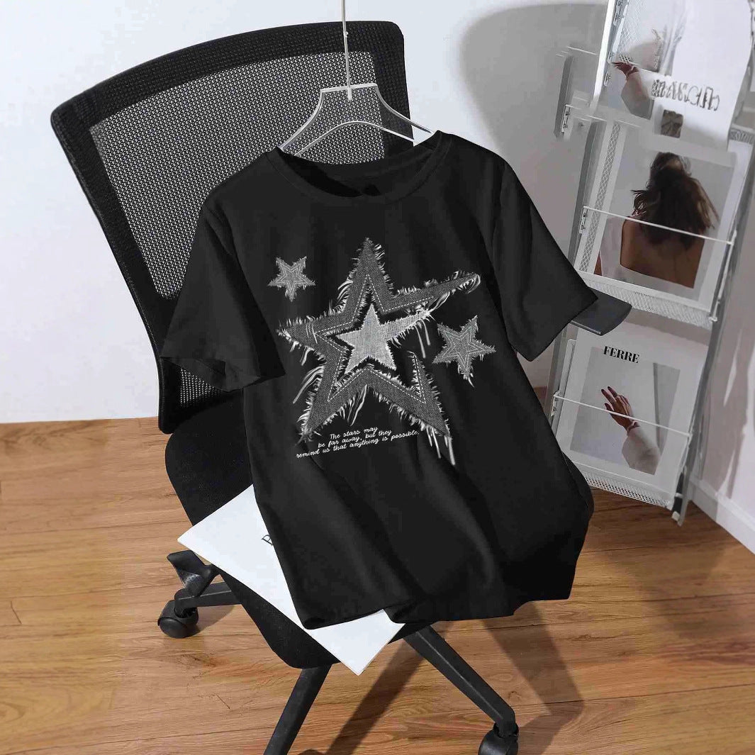 Dam T-shirt med trendig stjärnmotiv och avslappnad passform Mirla-Eva Jonsson