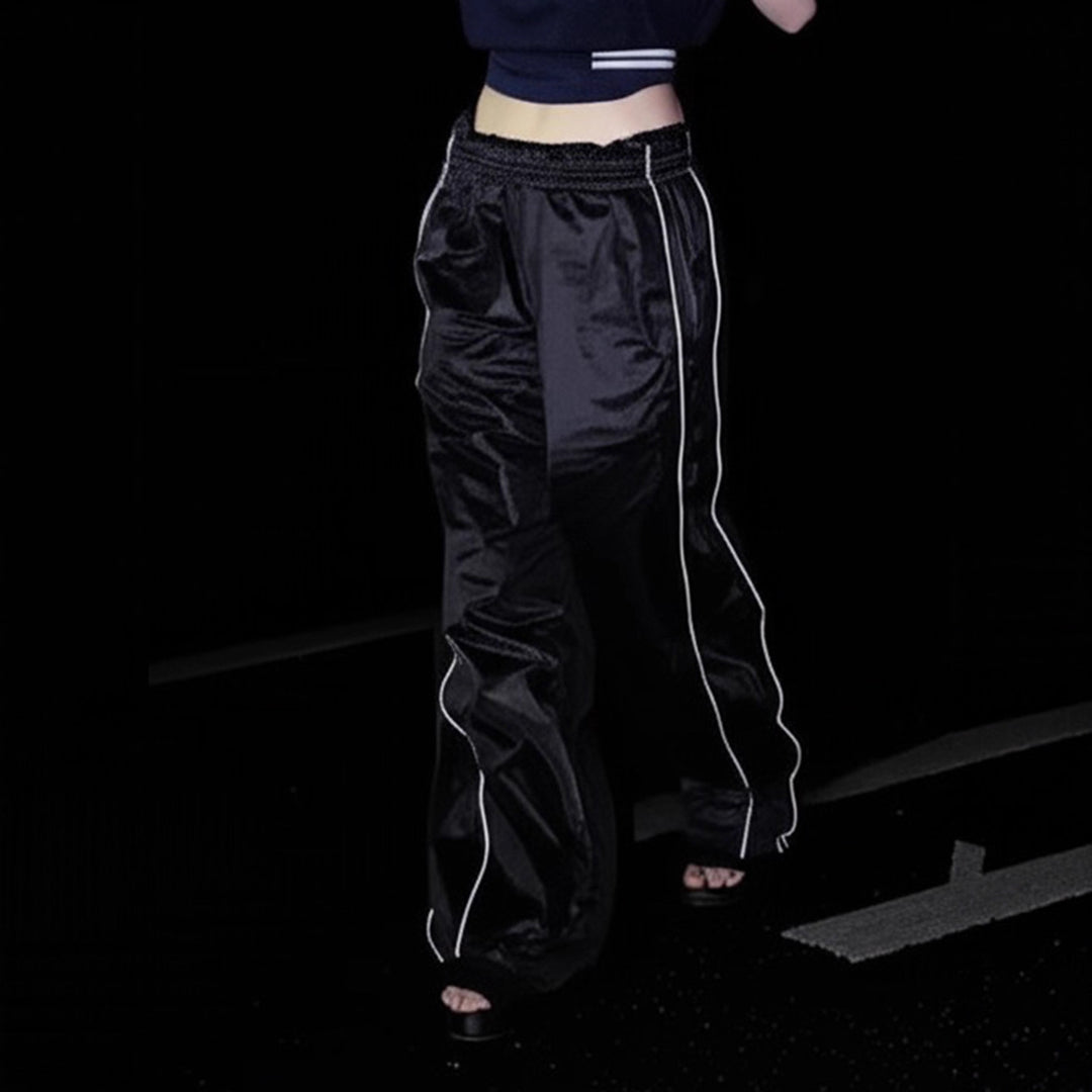 Dam Trendig Relaxed Fit Sportsbyxor med elastisk midja och sidodragkedjor Mirla-Eva Jonsson