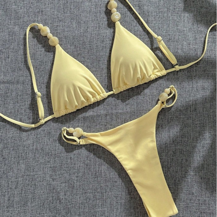 Dam Triangel-Bikini med dekorativa pärlaccenter och fin minimaldesign Mirla-Eva Jonsson