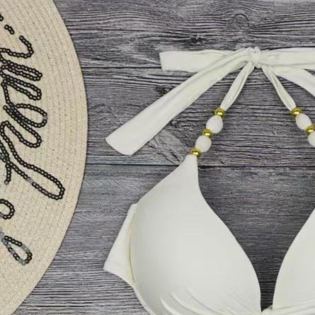 Dam Triangel-Bikini med lekfullt knytdesign och eleganta pärlor Mirla-Eva Jonsson