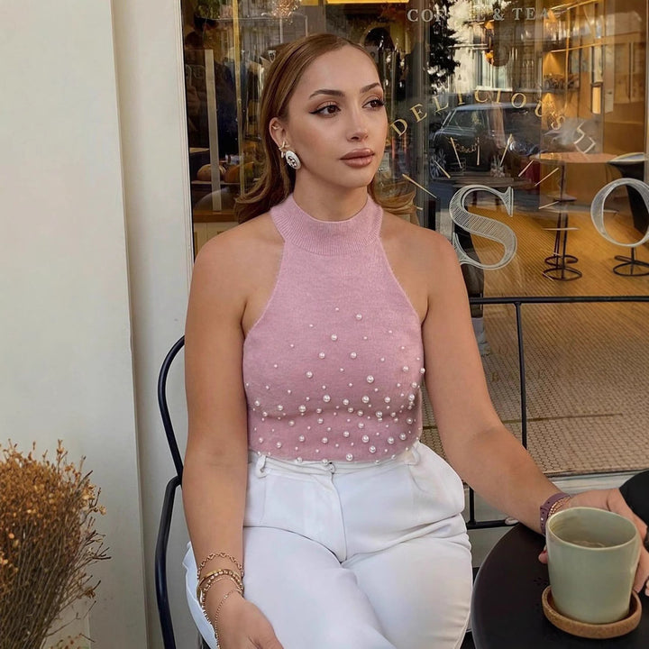 Dam ärmlös topp med dekorativa pärldetaljer Mirla-Eva Jonsson