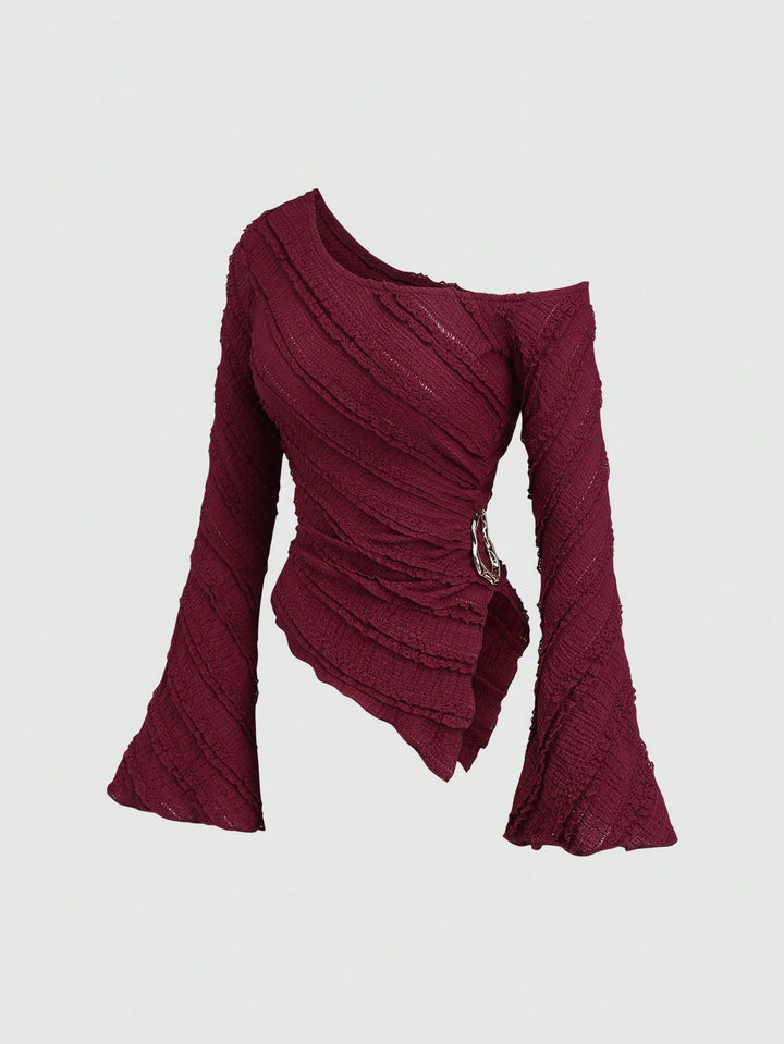 Dam asymmetrisk topp med strukturerad design och wrap-stängning Mirla-Eva Jonsson