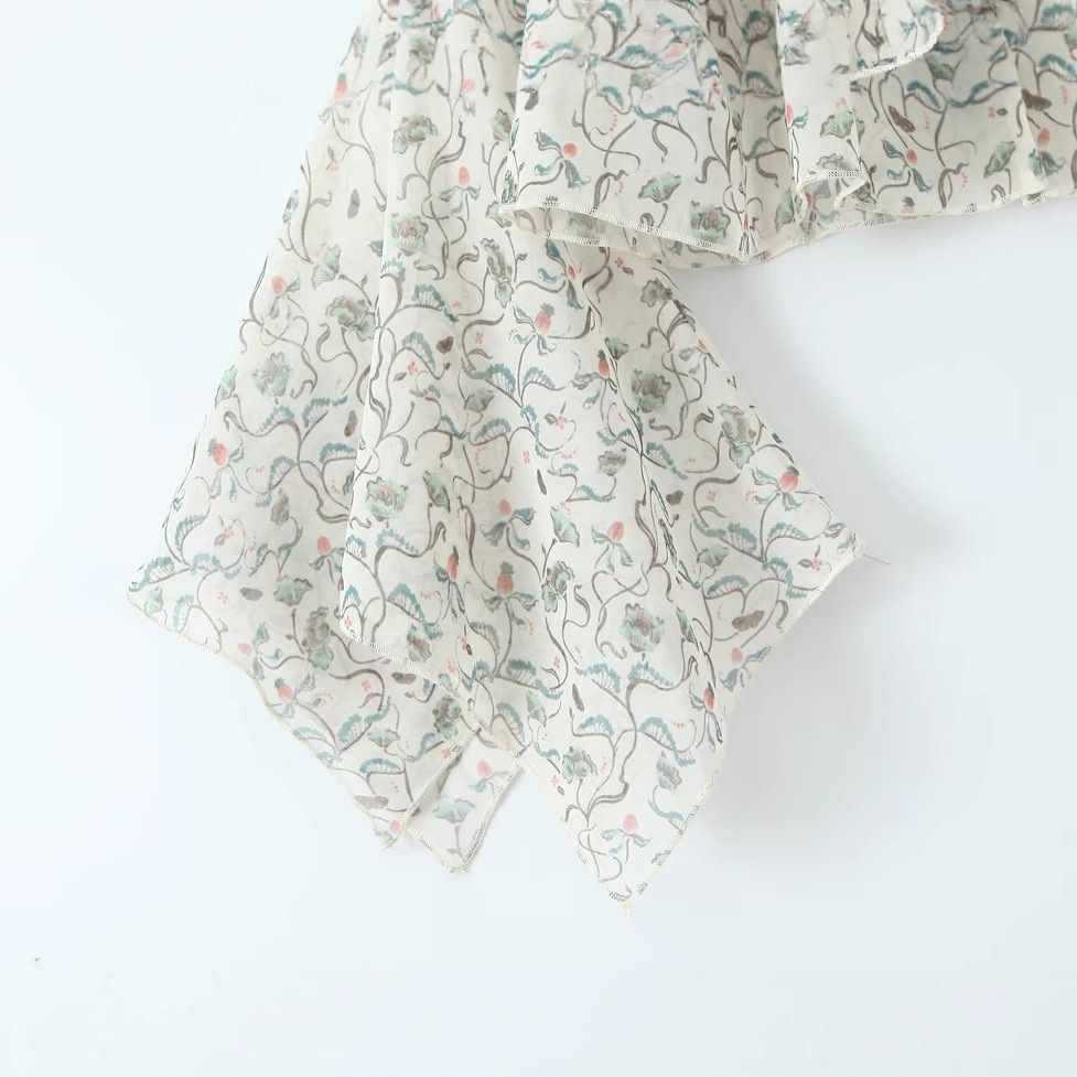 Dam avslappnad blus med eleganta klockärmar och blommönster Eva Jonsson-Eva Jonsson