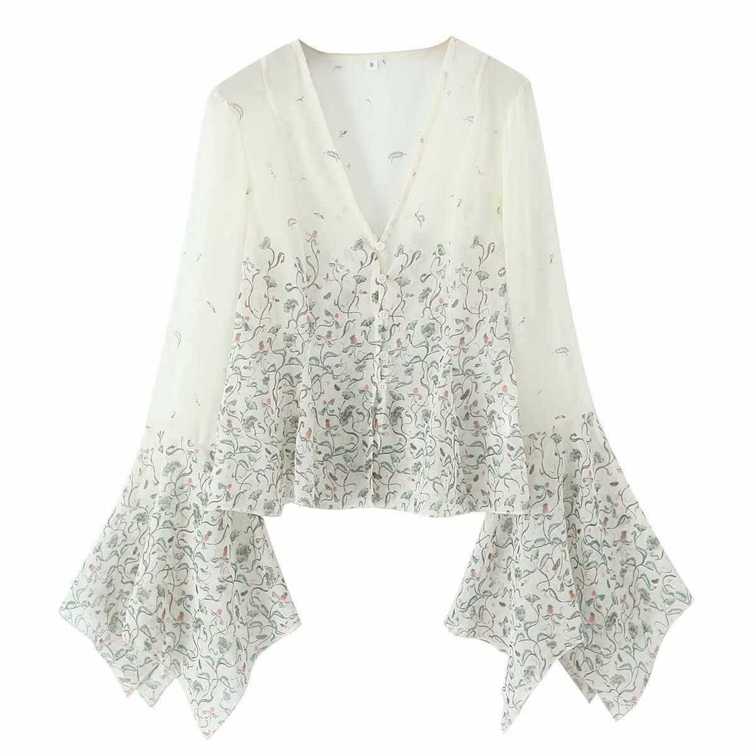 Dam avslappnad blus med eleganta klockärmar och blommönster Mirla-Eva Jonsson