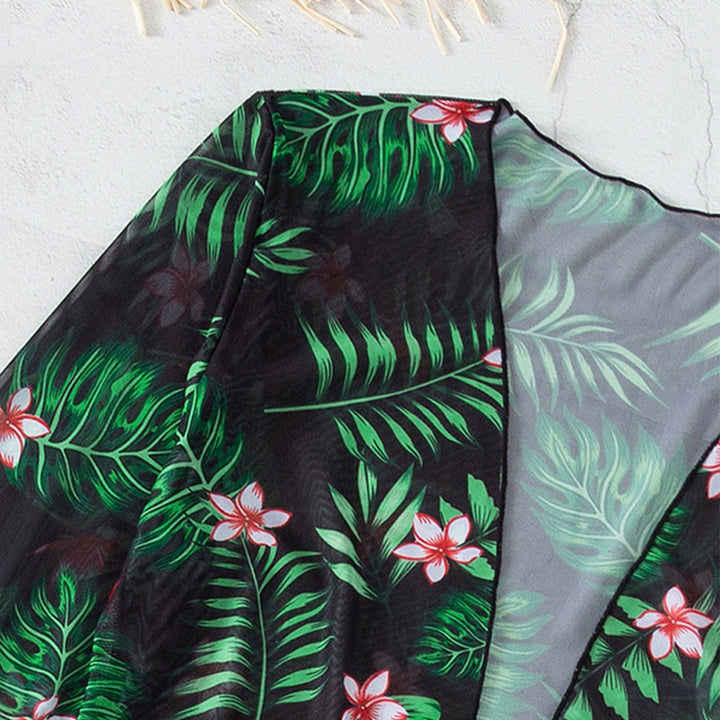 Dam bikini-set med genomskinlig kimono och blommig topp Mirla-Eva Jonsson