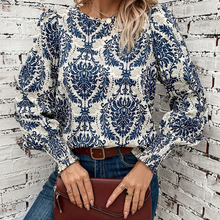 Dam blus med blommönster och puffärmar Eva Jonsson-Eva Jonsson