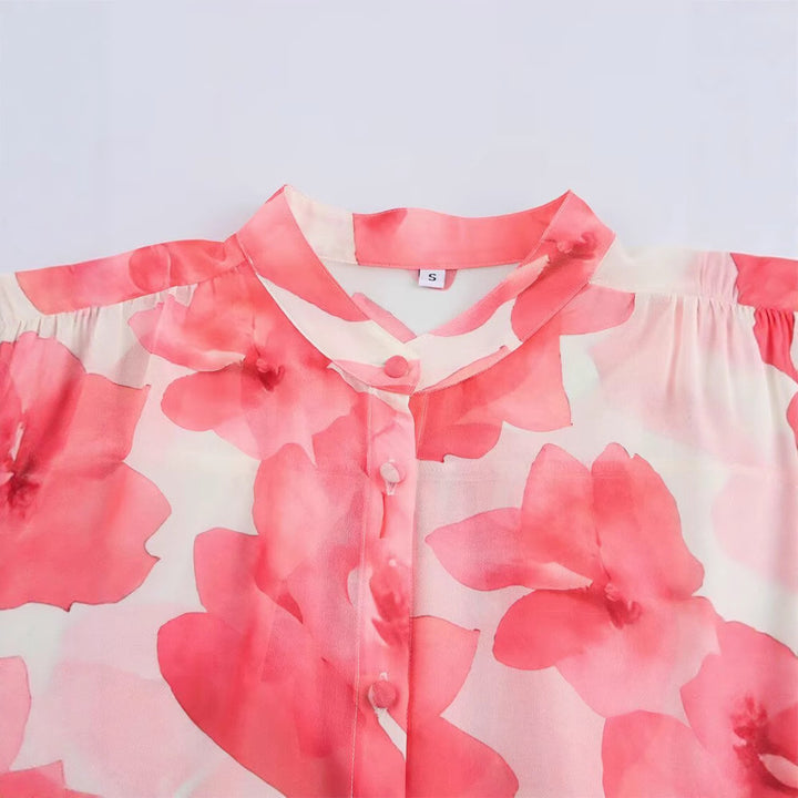 Dam blus med volangdetaljer och blommönster Mirla-Eva Jonsson