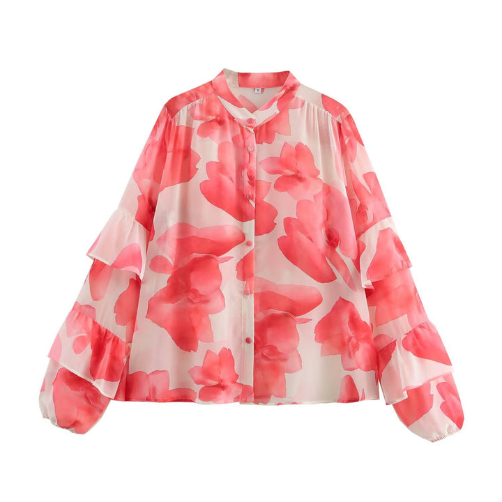 Dam blus med volangdetaljer och blommönster Mirla-Eva Jonsson
