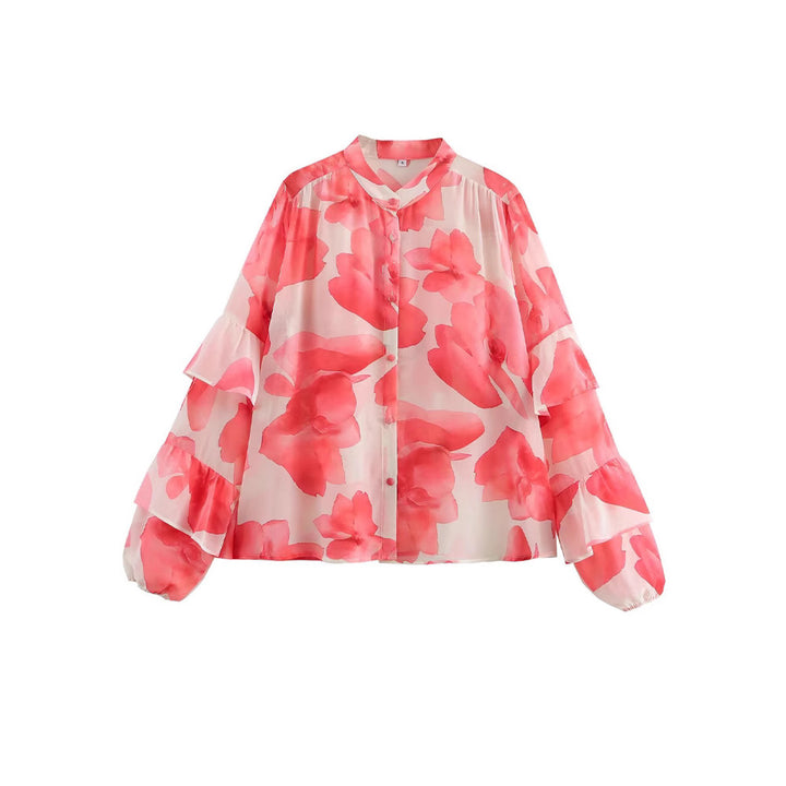 Dam blus med volangdetaljer och blommönster Mirla-Eva Jonsson