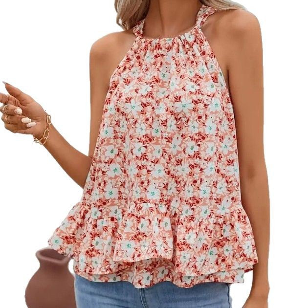 Dam blus topp med voluminös volang nederkant och blommönster Eva Jonsson-Eva Jonsson