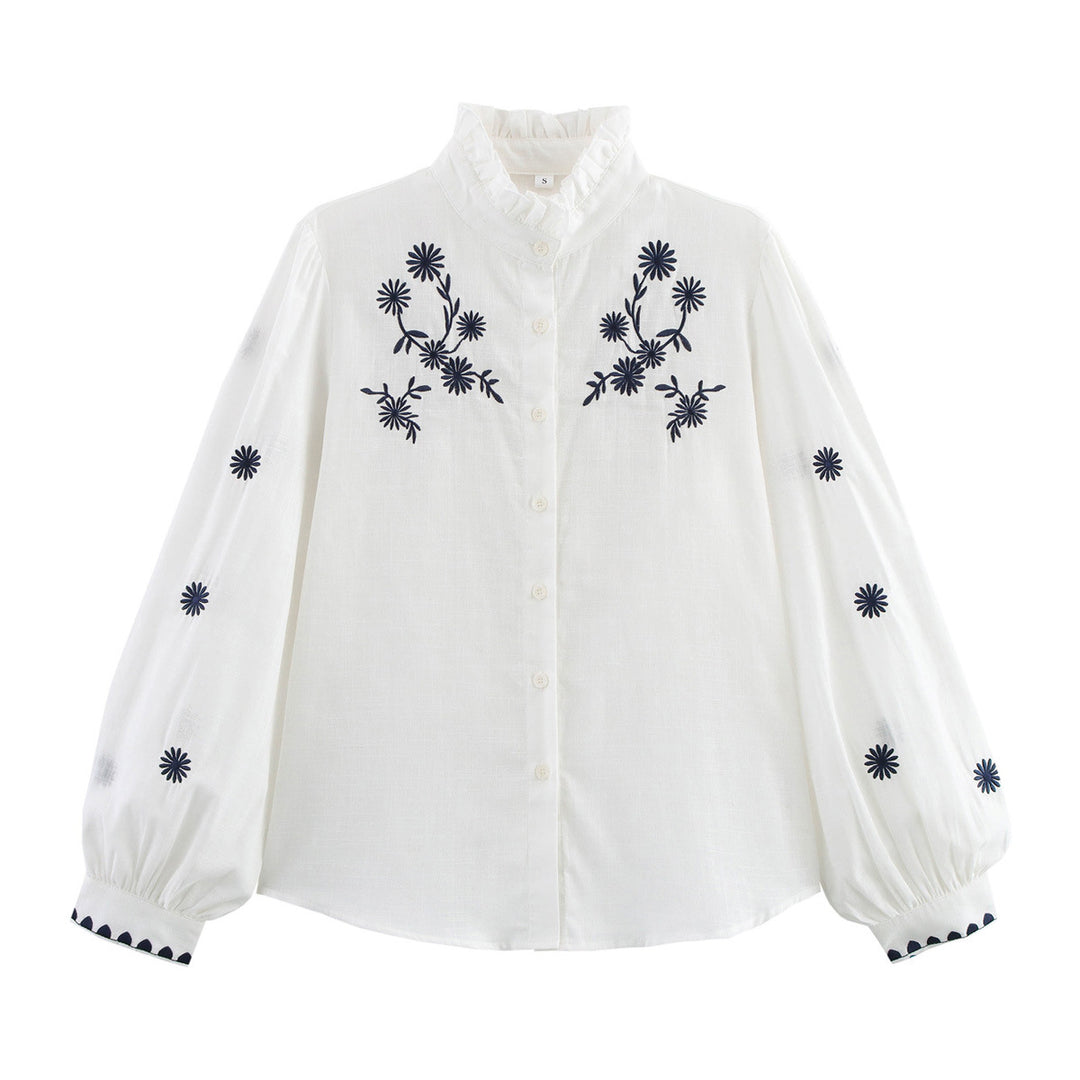 Dam blusigt överdel med florala broderidetaljer och voluminösa ärmar Eva Jonsson-Eva Jonsson