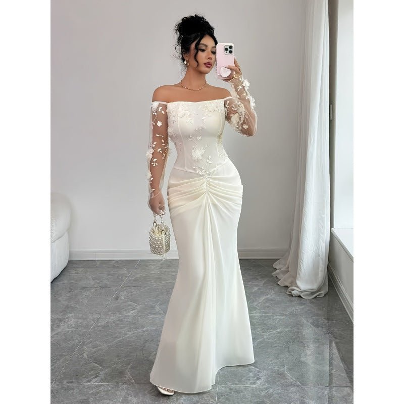 Dam bröllopsklänning med eleganta broderier Mirla-Eva Jonsson