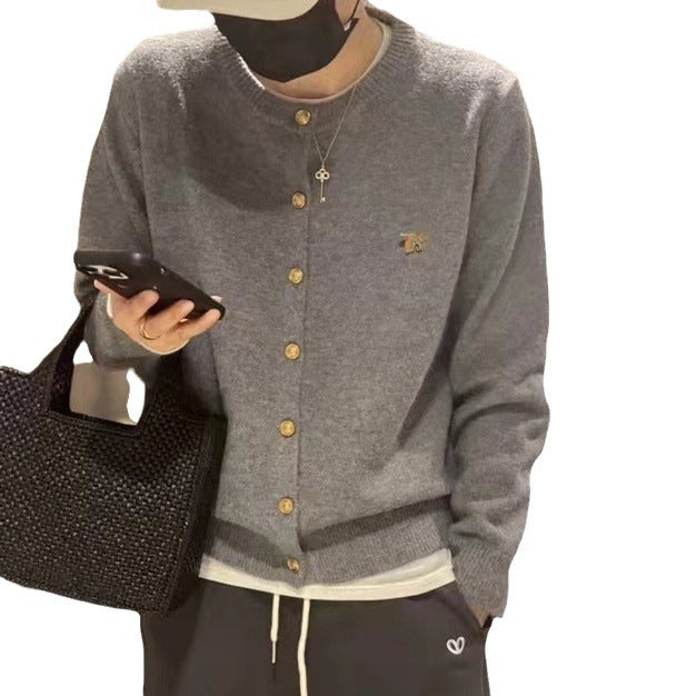 Dam cardigan med gyllene knappar och högkvalitativ materialstruktur Eva Jonsson-Eva Jonsson