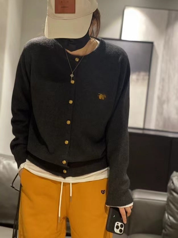 Dam cardigan med gyllene knappar och högkvalitativ materialstruktur Eva Jonsson-Eva Jonsson
