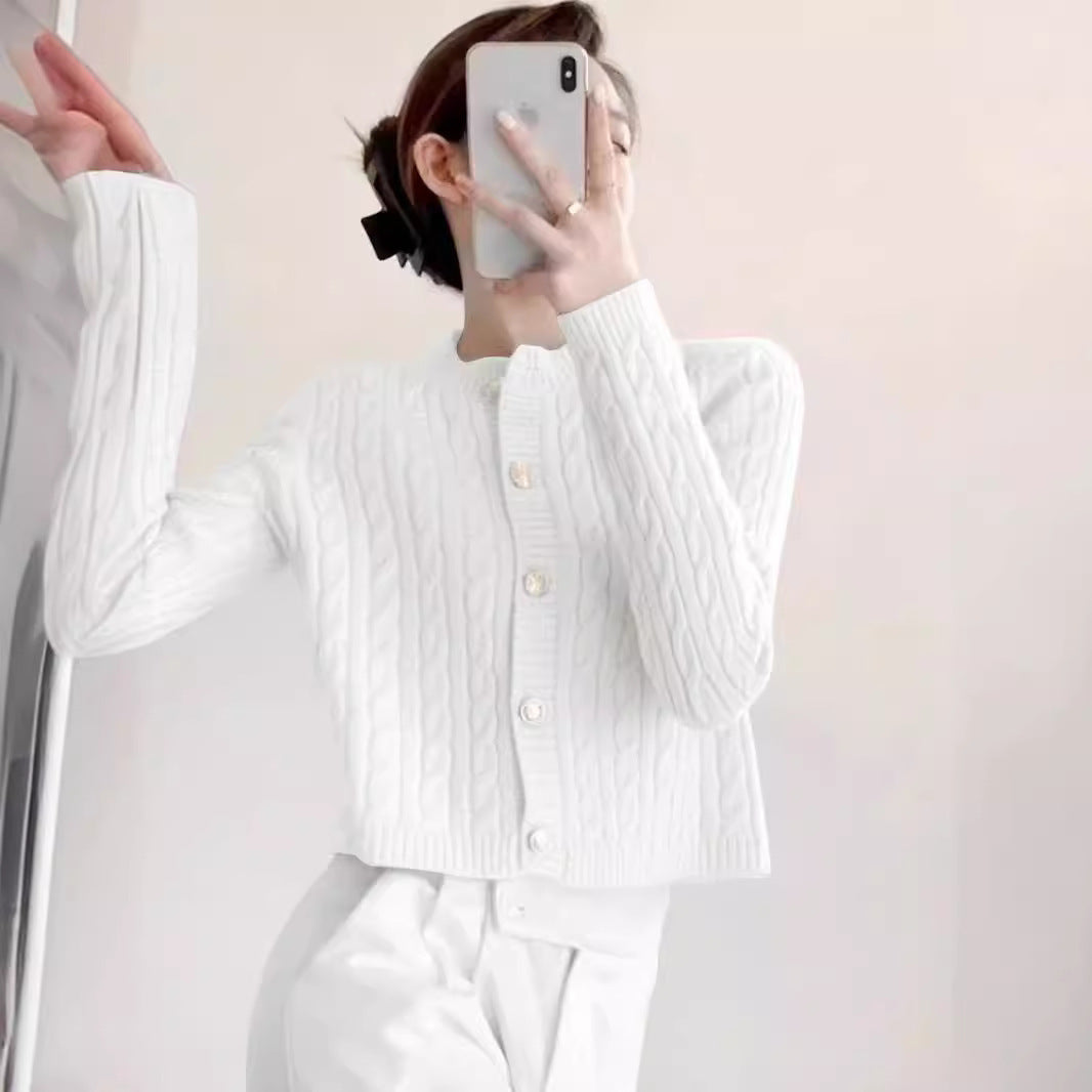 Dam cardigan med strukturerad design och modiga knappar Mirla-Eva Jonsson