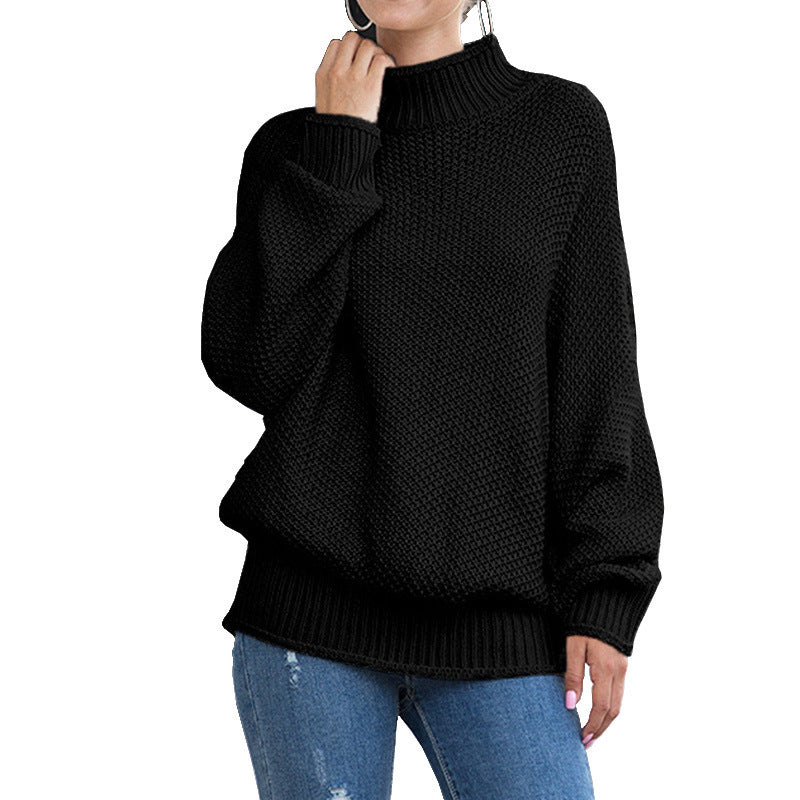 Dam chunky stickad tröja med hög krage och vida ärmar Mirla-Eva Jonsson